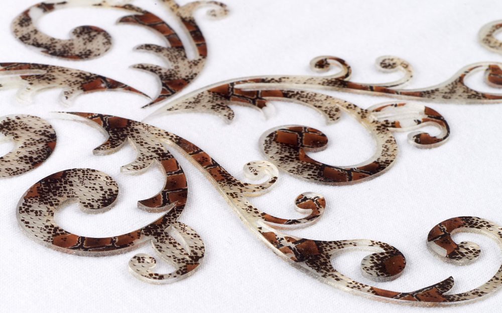 Borchie gel mattonella su tessuto