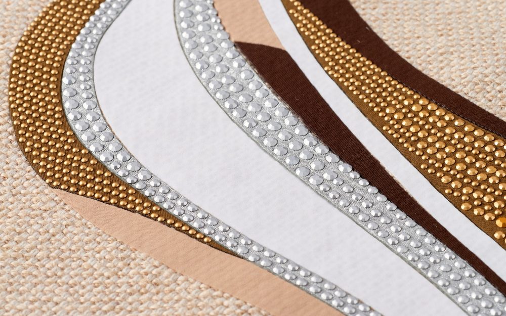 Decorazione di tessuti termoadesivati