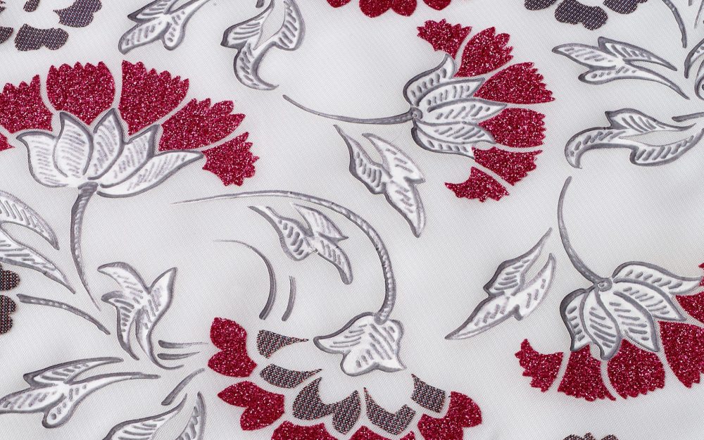 Transfer floreale con glitter su tessuto