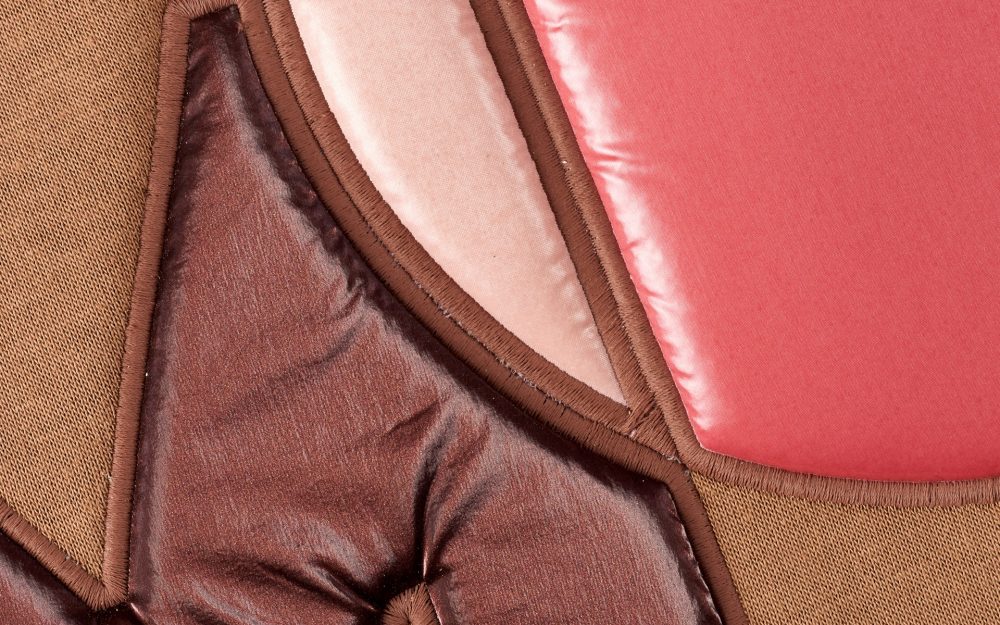 Tessuto imbottito inserti